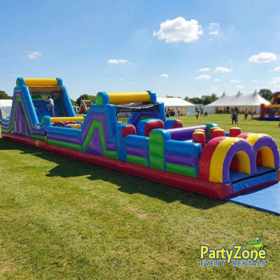 70ft Extreme inflatable obstacle course rental for Metairie LA carnivals and community events