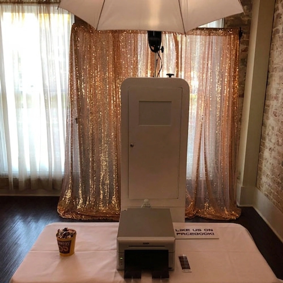 Platinum package photo booth rental with custom prints for Metairie LA weddings and quinceaneras